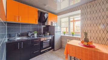 Classic Apartment | Private kitchen | Fridge, microwave, oven, stovetop