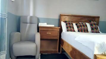 Standaard eenpersoonskamer | Geluiddichte muren, een strijkplank/strijkijzer, gratis wifi, beddengoed