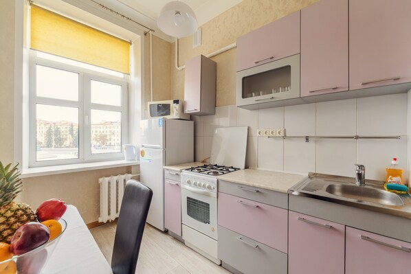 Apartament | Cuina privada | Frigorífic, bullidora elèctrica i productes de neteja 