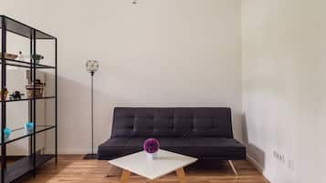 1 habitación, insonorización y tabla de planchar con plancha