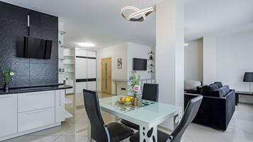 Departamento | Cocina privada | Refrigerador con congelador, horno y parrilla de estufa