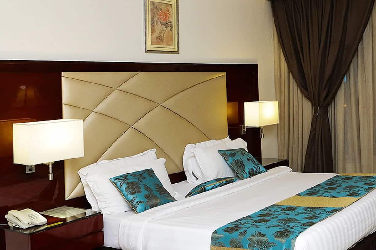 Premium bedding, down comforters, memory foam beds, in-room safe