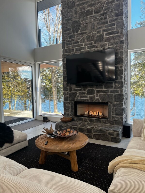 Smart TV, fireplace, table football, books