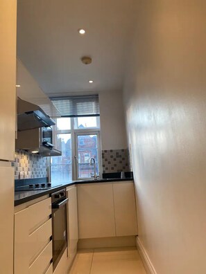 Apartamento, 2 camas Queen | Cozinha privada | Geladeira, micro-ondas, fogão, cooktop