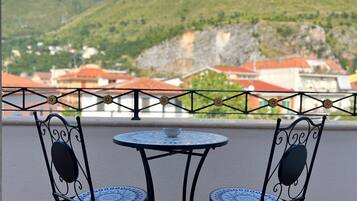 Deluxe Room, Balcony, City View | Terrace/patio