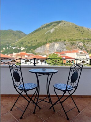 Deluxe Room, Balcony, City View | Terrace/patio