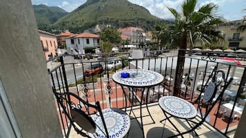 Deluxe Room, Balcony, City View | Free minibar, in-room safe, individually decorated
