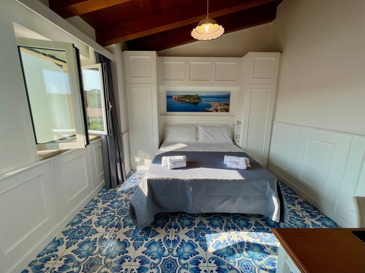 Family Quadruple Room | Free minibar, in-room safe, individually decorated