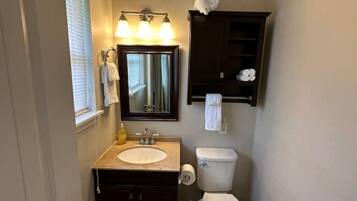 Hair dryer, towels, soap, shampoo