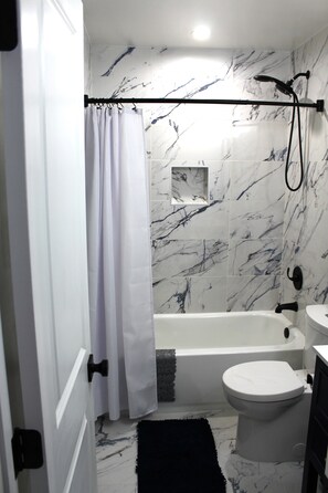 Hair dryer, towels, soap, shampoo