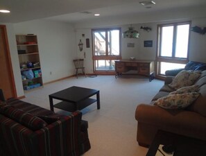Smart TV, fireplace, DVD player, foosball
