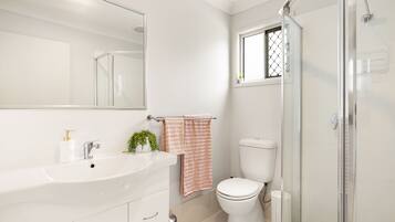 Hair dryer, towels, soap, shampoo