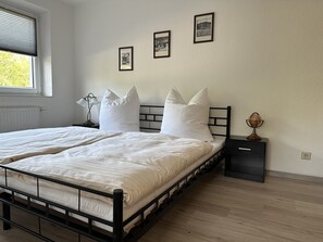 2 bedrooms, travel crib, WiFi, bed sheets