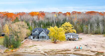 Waterfront Luxury Vacation Home with Stunning Sunsets and Sandy Shoreline