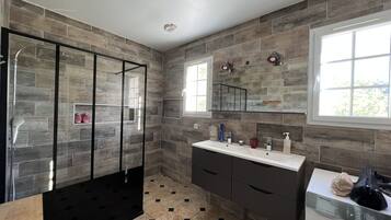 Shower, hair dryer, towels, soap
