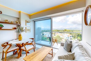 TV, table tennis - Updated condo with sweeping views, pools, fitness room, balcony, W/D, and AC (Bucerias)