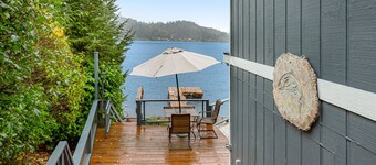 Lakefront retreat with kayaks, canoe, game tables, children's items, and W/D