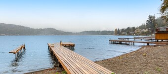 Lakefront retreat with kayaks, canoe, game tables, children's items, and W/D