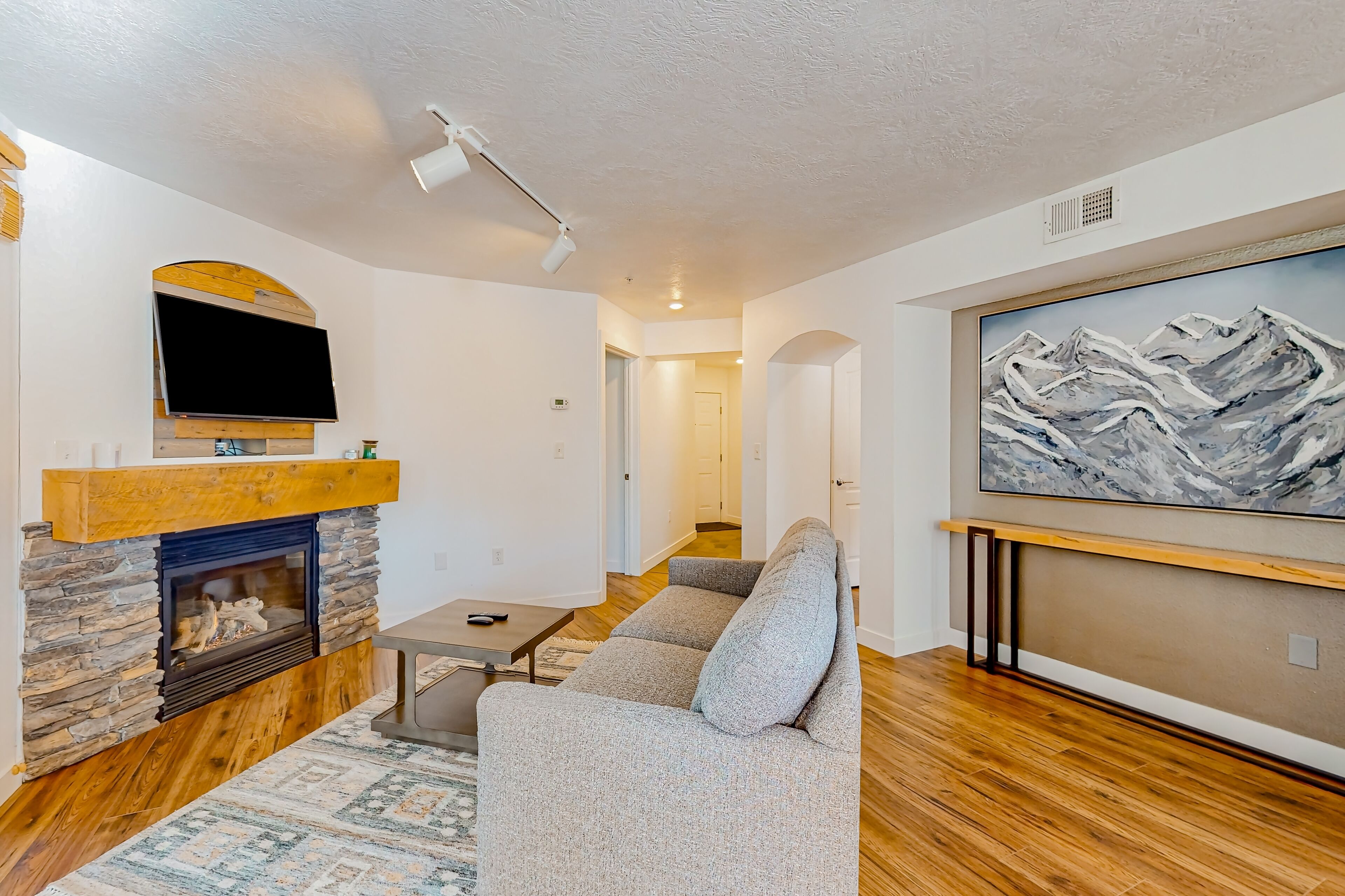 Stunning alpine escape w/ pool, hot tub, fireplace, balcony, & mountain views