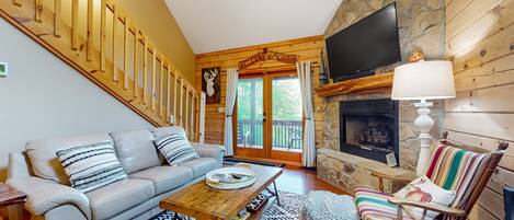 Televisión, chimenea, mesa de ping pong, libros