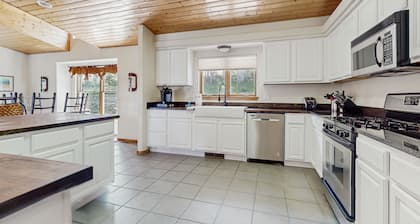Dog-friendly home with mtn views, game room, firepit, decks, grill, & fireplace