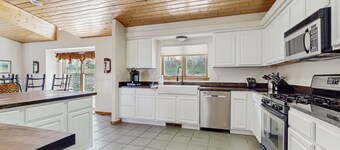 Dog-friendly home with mtn views, game room, firepit, decks, grill, & fireplace