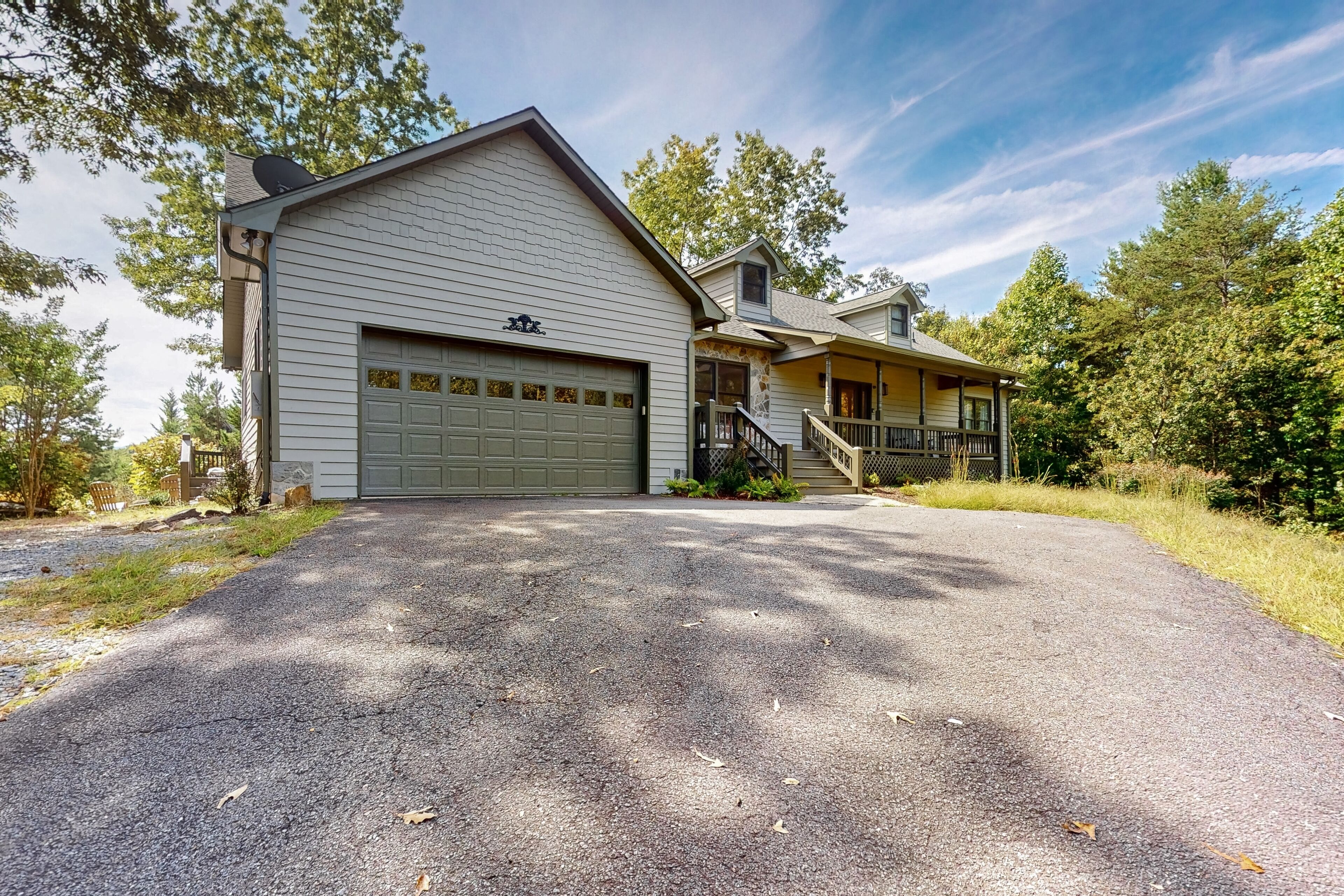 Fully renovated dog-friendly home with large deck, firepit, fireplace, grill, AC