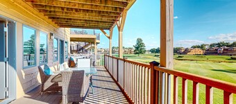 Golf course-front condo with pool, hot tub, dock, tennis, golf, & private beach