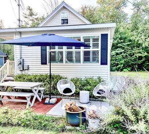 Outdoor dining - Quintessential lakeside cottage with swimming, picnic tables, & mountain view (Meredith)