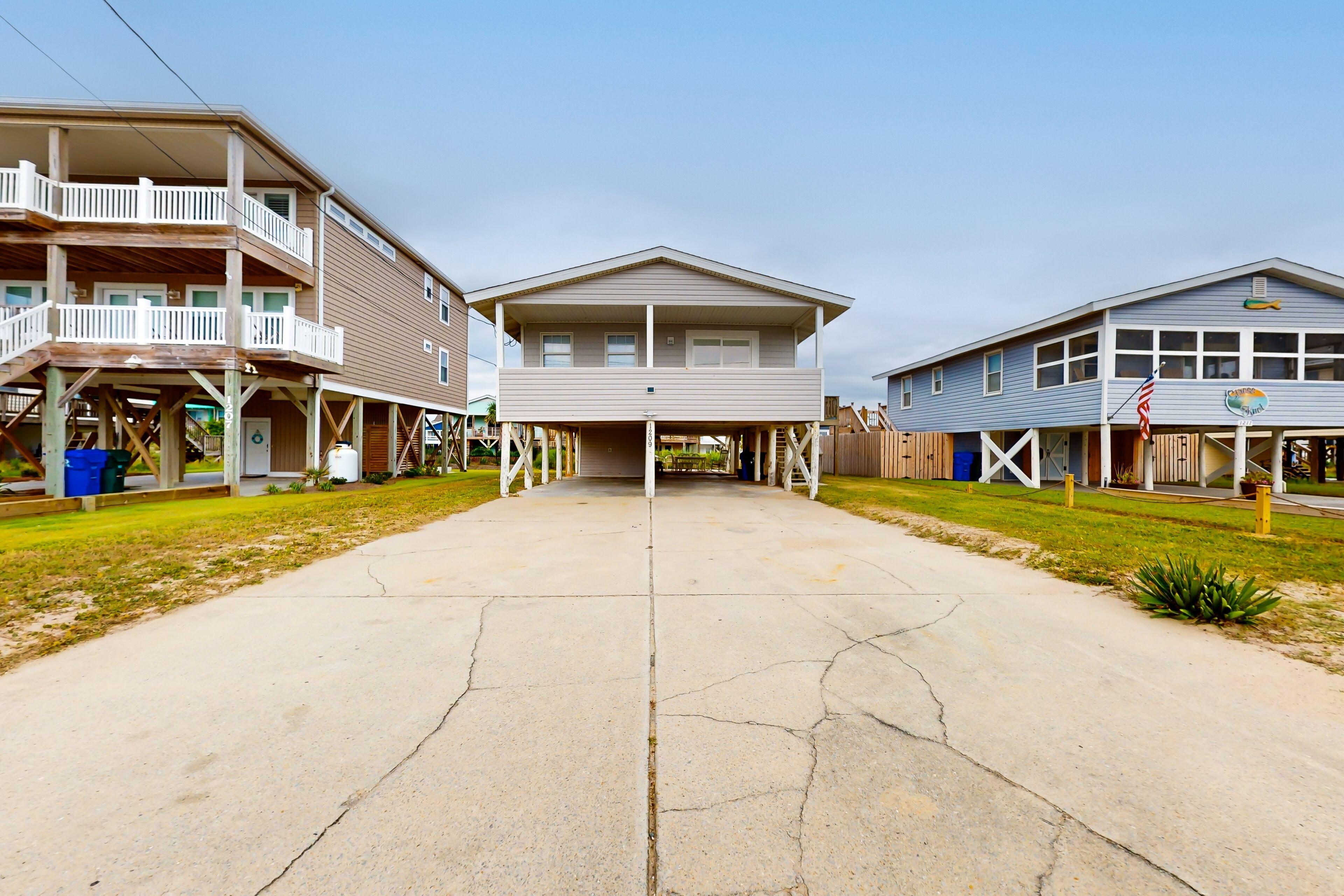 Ocean view home steps from beach with front porch, deck, & W/D