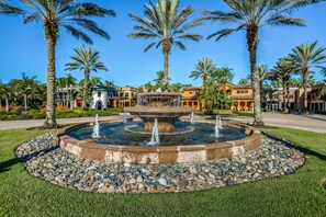 Property grounds - Resort condo with private W/D, shared pool, and central AC (Naples)