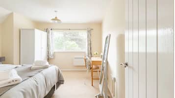 1 bedroom, desk, iron/ironing board, travel cot