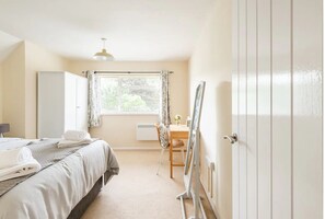 1 bedroom, desk, iron/ironing board, travel cot