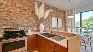 Fridge, microwave, stovetop, coffee/tea maker