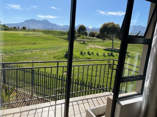 On a golf course, mountain views, 5 min drive from the beach and 7 for hiking