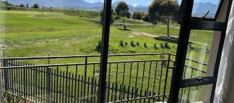 On a golf course, mountain views, 5 min drive from the beach and 7 for hiking