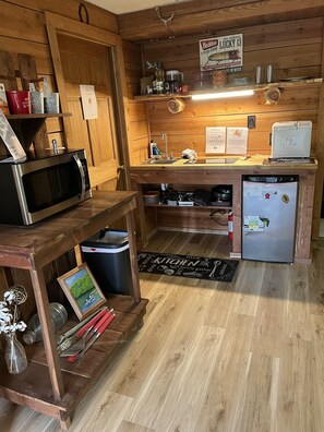 Fridge, microwave, stovetop, coffee/tea maker