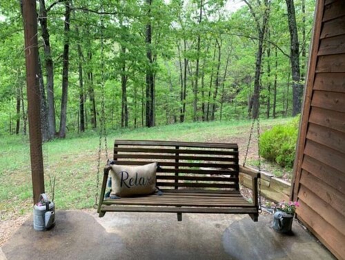 Relax in the Ozark woods at a quiet nature retreat with a private walking trail.