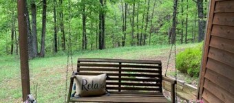 Relax in the Ozark woods at a quiet nature retreat with a private walking trail.