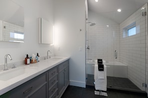 Shower, hair dryer, towels, soap