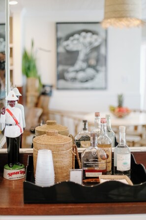 Luxury Cottage | Living area | 65-inch Smart TV with cable channels, books - The Rock House Hotel (Dunmore Town)