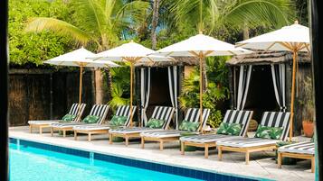 Outdoor pool, free cabanas, pool umbrellas
