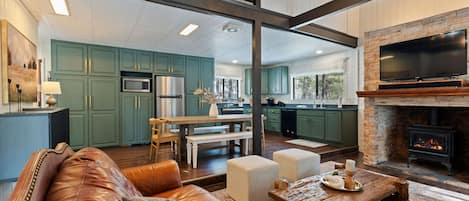 TV, fireplace, books