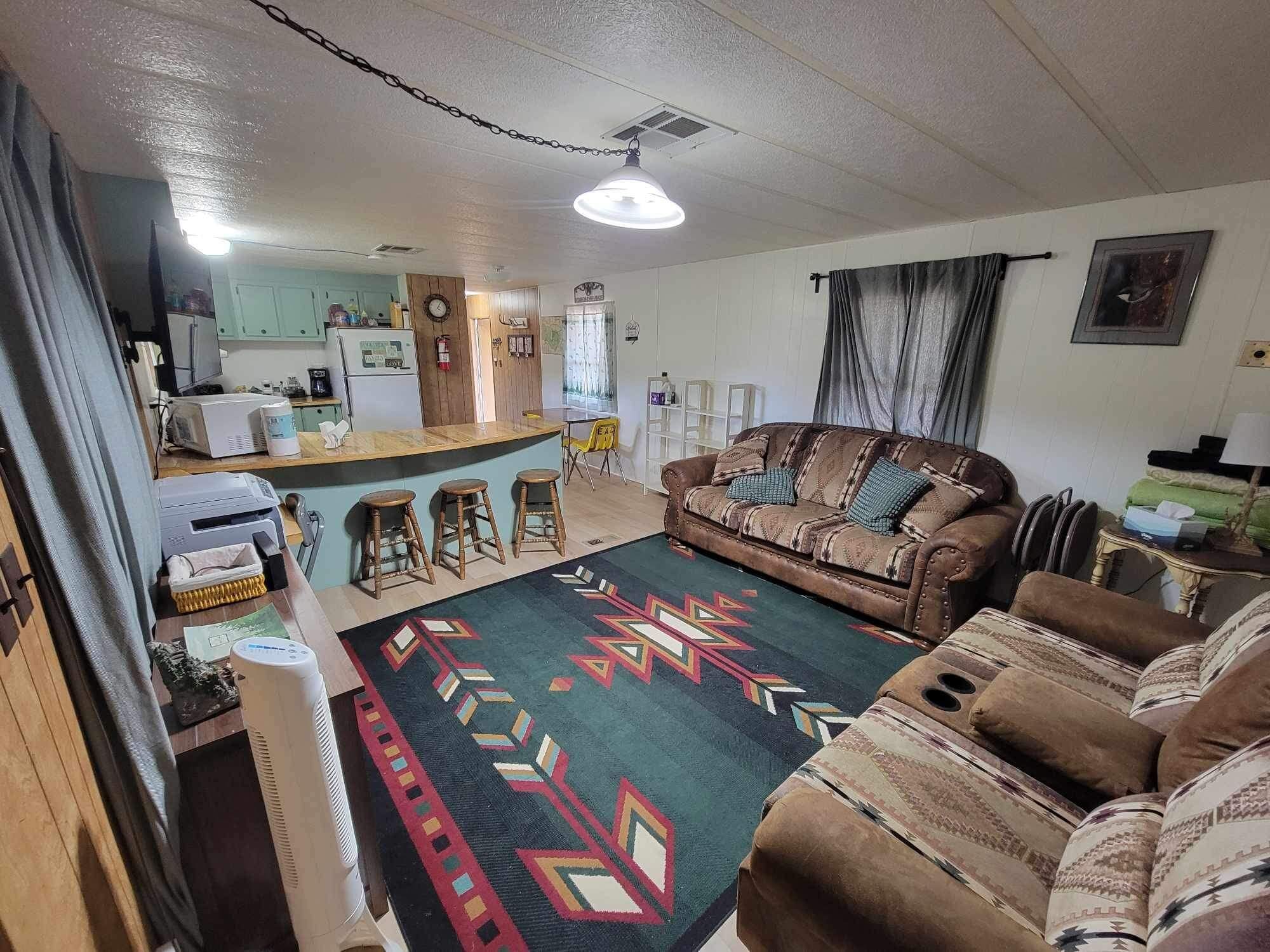 TV, fireplace, books, printers