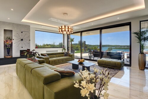 Luxury villa La Casaccia with a heated pool near Medulin with a stunning sea view.