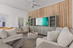 Smart TV, chimenea, futbolito y tenis de mesa
