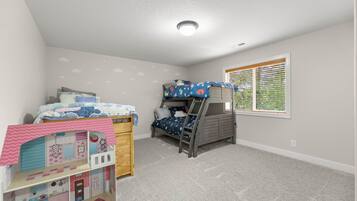 4 bedrooms, desk, iron/ironing board, travel cot