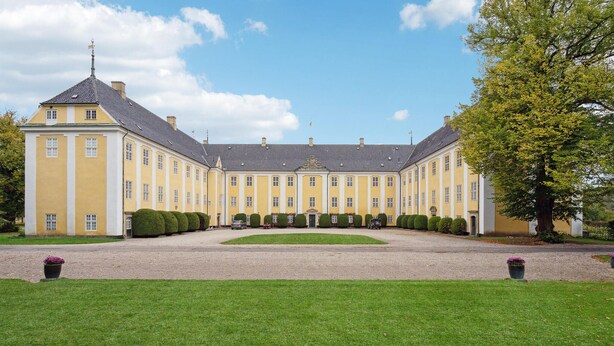 A large, symmetrical building with a central courtyard, likely a historic or governmental building. - Gorgeous home in Næstved (Næstved)