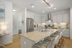 Fridge, microwave, oven, stovetop - Indigo Breeze - Luxury Vacation Rental Close to the Beach with Private Pool & Game Room (Santa Rosa Beach)