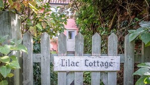 A wooden gate with a sign that reads "Lilac Cottage." - Lilac Cottage, Wenhaston (Halesworth)